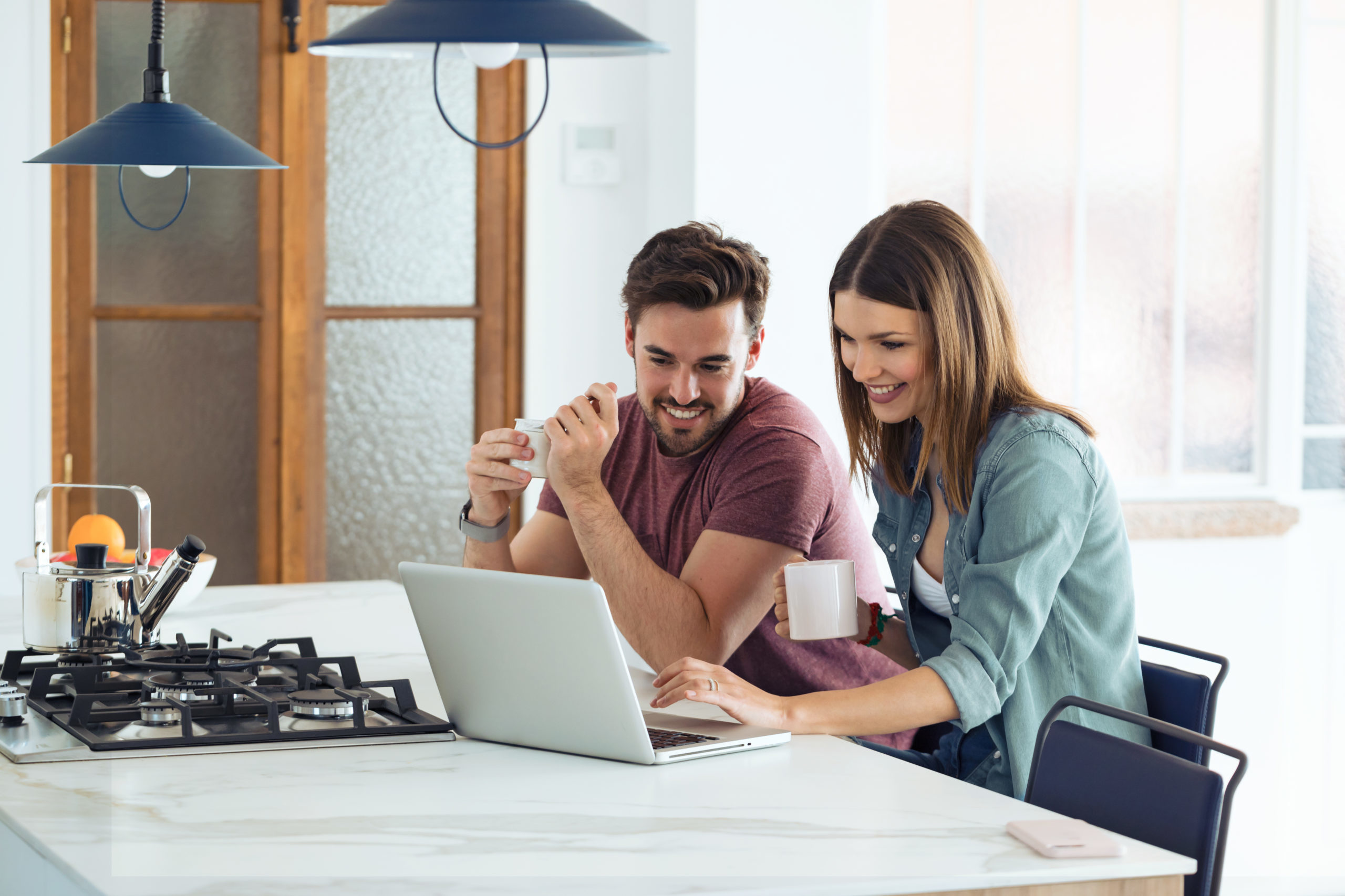 Couple using laptop